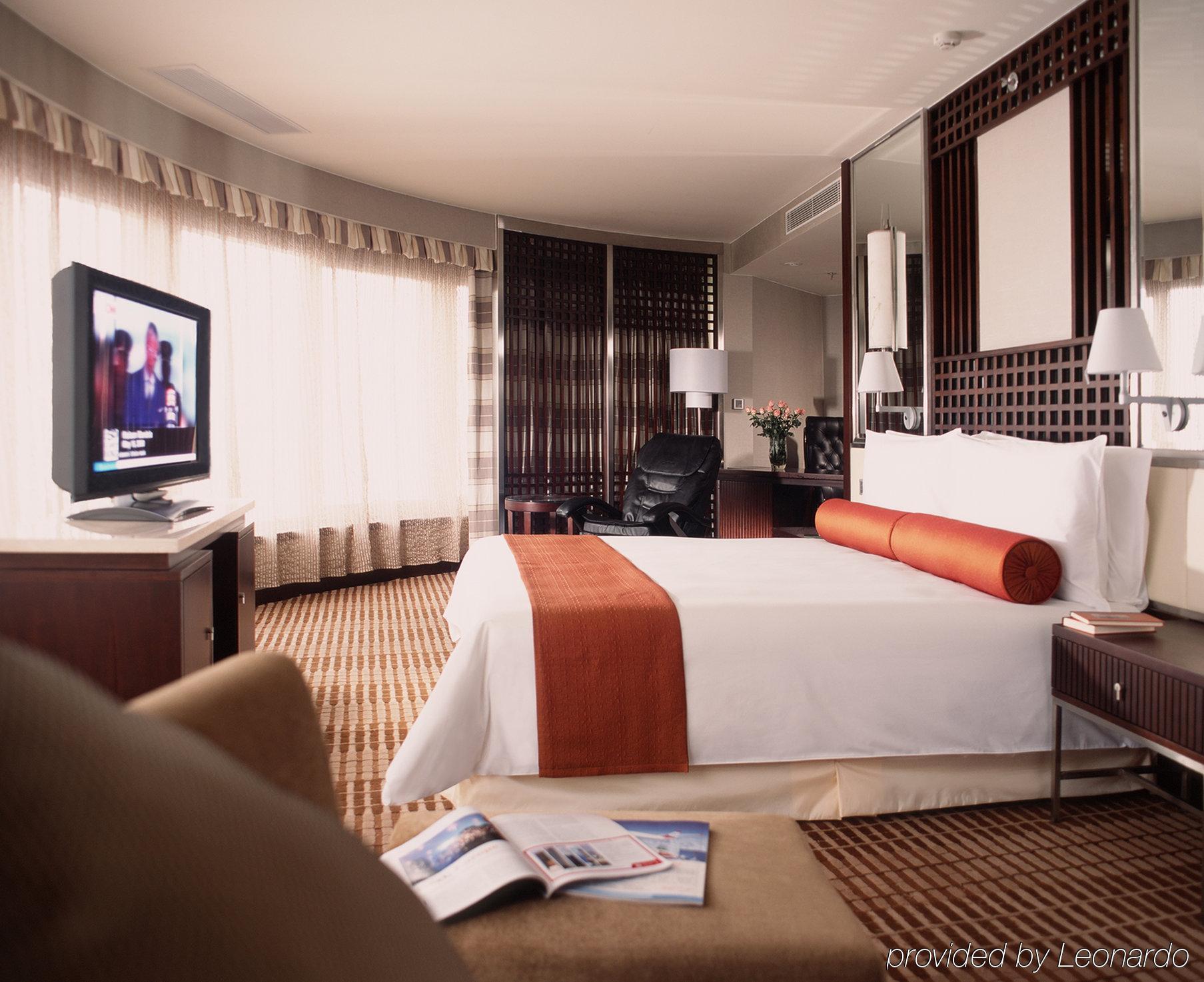 Hotel Nikko เทียนจิน ภายนอก รูปภาพ A bedroom at the hotel